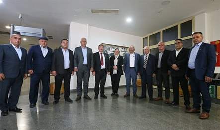 Buharkent Muhtarlar Derneği Başkanı Ali Arslan ve yönetim kurulu üyeleri,