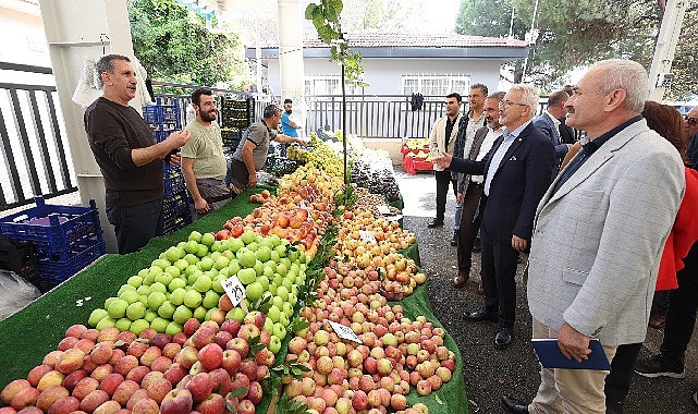 Nilüfer Belediyesi’nin Altınşehir Mahallesi’ne kazandırdığı kapalı pazar alanı, düzenlenen törenle