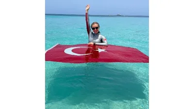 Spor Toto Spor Kulübü sporcusu, milli dalgıç ve Birleşmiş Milletler