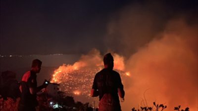 Balıkesir’in Gömeç ilçesinde başlayan orman yangını, kuvvetli rüzgarın etkisiyle İzmir’in